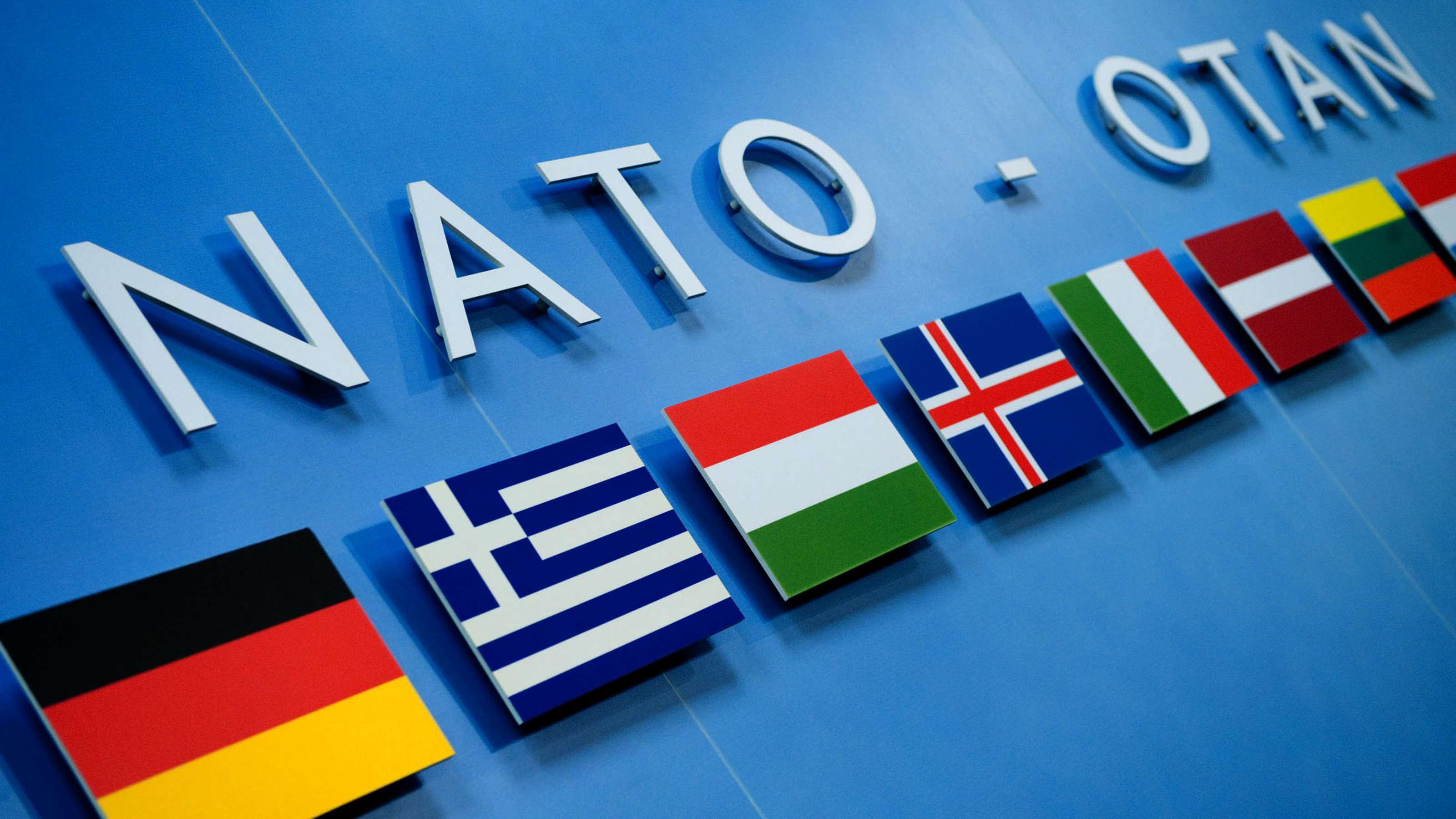 Nato. Флаги стран НАТО. НАТО картинки для презентации. Атлантическое сотрудничество (НАТО). Образование НАТО картинки.