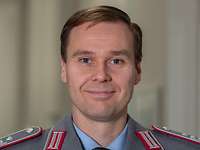 Joachim Ruthe smiles into the camera for a portrait shot.